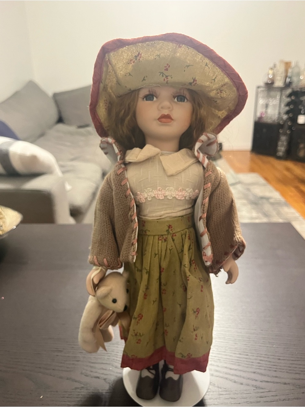 Vintage-Style Porcelain Doll in Olive Green and Beige Outfit